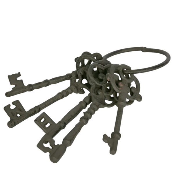 Set of five vintage-style cast iron keys on iron ring, brown patina finish