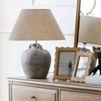 rattan wavy photo frame 4x6 inch styled on natural chest of drawers with natural decor, natural woven picture frame for Hamptons style home interiors