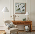 Reiss antique brass floor lamp styled in a classic living room reading corner
