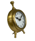 Round face gold footed clock with classic white dial and black numerals