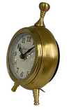 Round face gold footed clock with classic white dial and black numerals