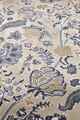 Sanderson Shalimar China Blue Rug with hand-tufted floral tree-of-life design in blue and gold tones