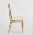 Side profile of natural rattan Dynasty Dining Chair with removable seat cushion