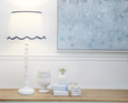Framed Canvas Light Rain artwork in soft grey, white, and blue tones with abstract rainfall effect, 100x100cm.