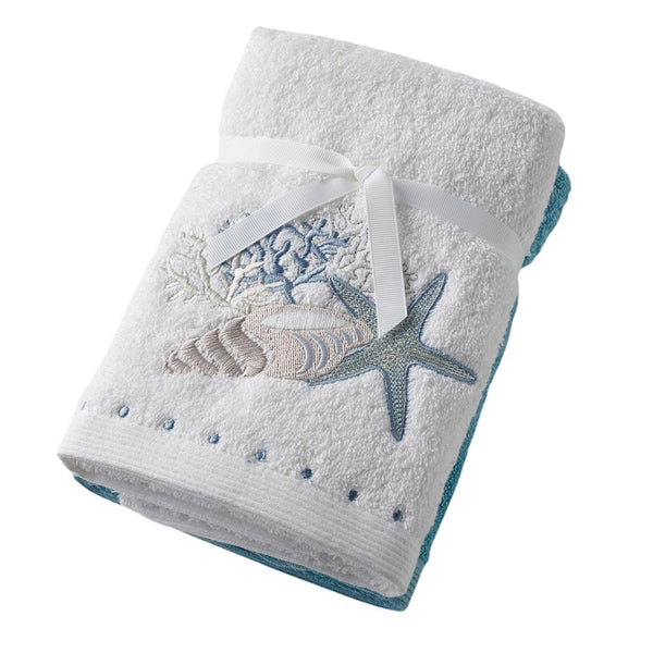 Seaside Hand Towel Set of 2, featuring one embroidered white towel with seashell and starfish design and one plain white towel, tied with a white ribbon.