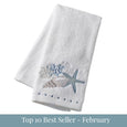 Seaside Hand Towel in soft white cotton with embroidered seashell, coral, and starfish motif with top 10 best seller - february overlay