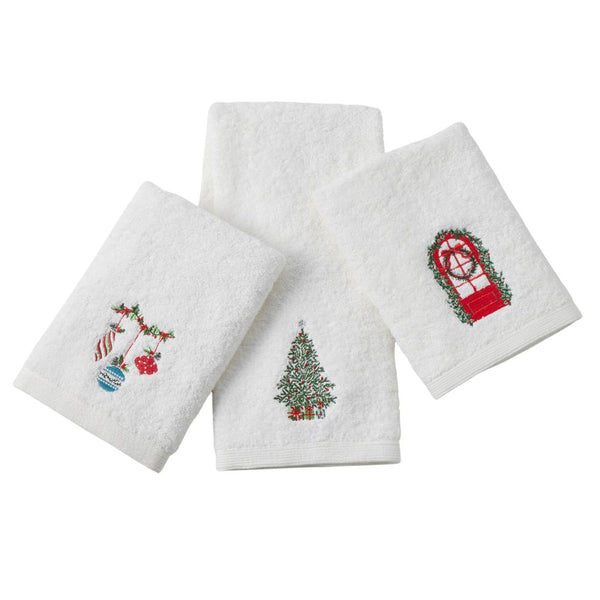 Set of three white cotton hand towels with embroidered Christmas motifs including ornaments, a Christmas tree, and a festive wreath window.