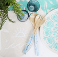 Servers Soft Blue Set/2 with natural bamboo spoons and soft blue Mother of Pearl handles styled on a dining table.