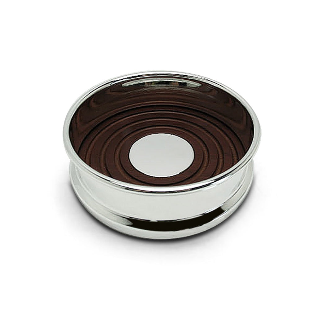 Silver plated bottle coaster detail showing circular timber insert and polished silver rim