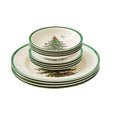 Spode Christmas Tree 12 piece dinner set with festive green rim plates and bowls stacked together