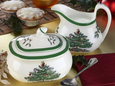 Spode Christmas Tree sugar bowl and creamer set featuring the classic festive tree design with green trim.