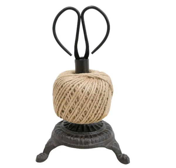 Cast iron string holder with natural jute twine and steel scissors.