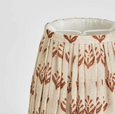 Close up of terracotta floral linen pleated lamp shade detail