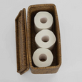 Brown rattan toilet paper holder showing interior storage for spare rolls