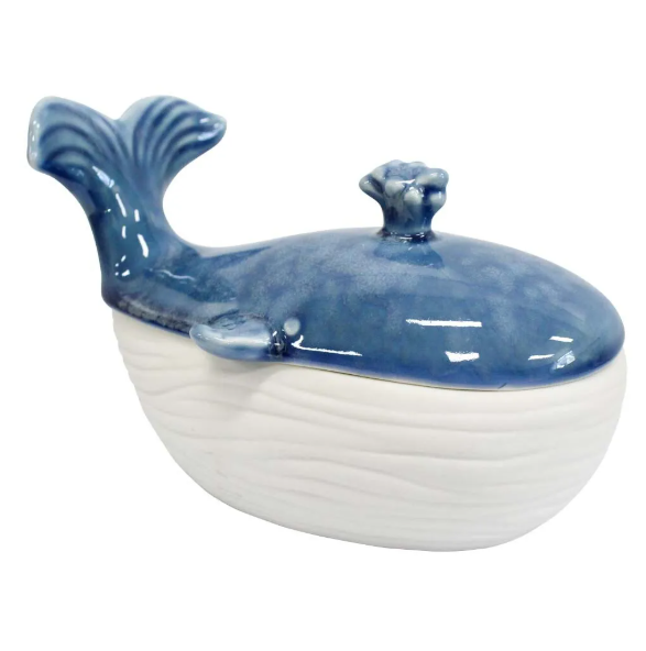 A sleek, white ceramic trinket box shaped like a whale, with a separate lid for small storage. The design is simple and elegant, suitable for Hamptons or coastal-themed home decor.