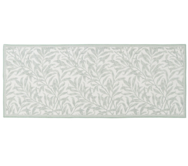 Willow Sage non-slip runner 60x150cm with sage botanical leaf pattern on white background placed on timber flooring