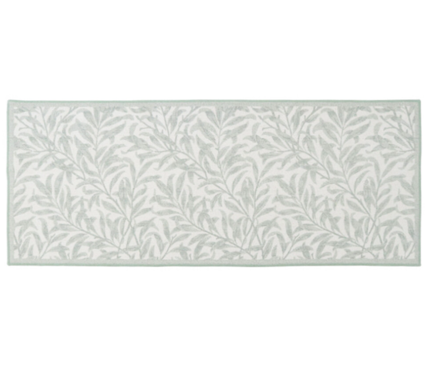 Willow Sage non-slip runner 60x150cm with sage botanical leaf pattern on white background placed on timber flooring