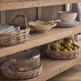 Willow tray with glass cover styled on wooden kitchen shelf