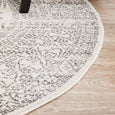 Curved edge of Addison Silver Round Rug in soft silver grey and ivory