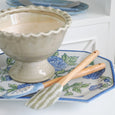 Alice Silicon Spatula styled on a blue floral serving tray beside a ceramic pedestal bowl, showcasing coastal kitchen styling.
