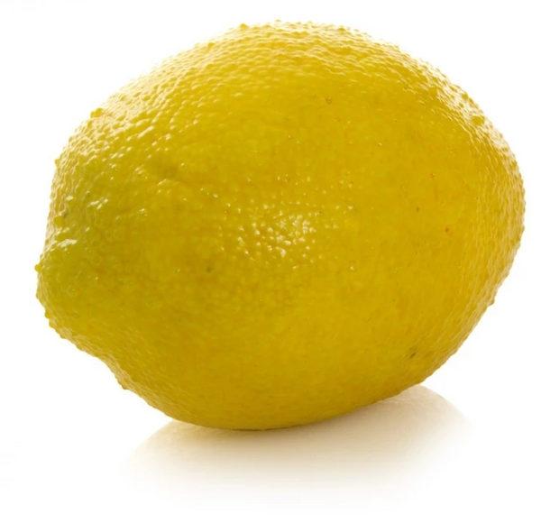 realistic artificial fruit and vegetables styled in a decorative kitchen bowl