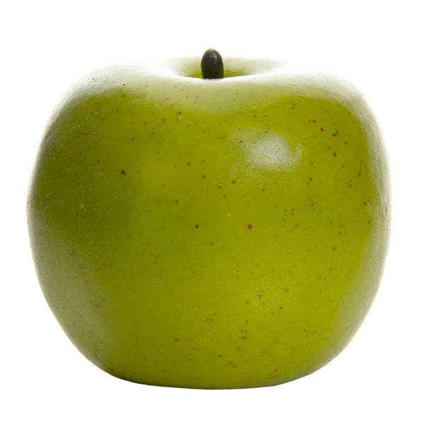 Realistic artificial green apples styled in a decorative bowl for home décor