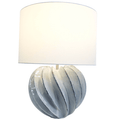 Arya lamp illuminated showing warm ambient light through cotton shade