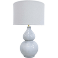 Aura Seafoam ceramic table lamp with linen drum shade styled in a coastal-inspired interior
