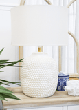 Front view of the Avalon Textured Table Lamp Large with textured ceramic base and linen shade