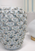 Textured blue ceramic vase with coral-inspired sculptural detailing and a glossy finish, perfect for Hamptons or coastal home styling.