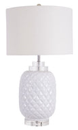 Bahamas white ceramic table lamp with crystal base and white linen drum shade styled in a coastal interior