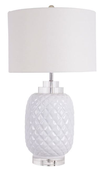 Bahamas white ceramic table lamp with crystal base and white linen drum shade styled in a coastal interior