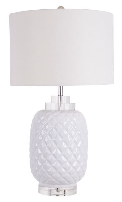 Bahamas white ceramic table lamp with crystal base and white linen drum shade styled in a coastal interior