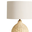 Close-up detail of the Balle Lamp's handwoven natural rattan craftsmanship.