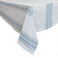 Bay Stripe blue and white cotton tablecloth draped over dining table in coastal style