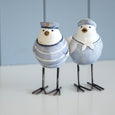 Front view of Beach Birds Set of 2 showing hand-finished blue and white nautical outfits, sailor hats and iron legs.