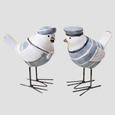 Pair of Beach Birds coastal ornaments featuring blue and white sailor outfits, decorative hats and slender iron legs.