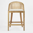 Front view of Beau natural timber counter stool with curved woven rattan back and white seat