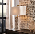 Front view of the Belgrade table lamp showcasing its textured marble base and soft white bouclé shade.