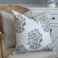 Bellamy Garden Cushion Sage Green styled on a timber chair in a relaxed Hamptons interior