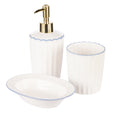 White ceramic soap dispenser with scalloped blue trim and gold-tone pump from the Bellamy Collection, ideal for Hamptons-style bathrooms. Set of 3 side angle view.