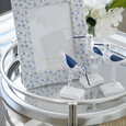 Bird Navy White Set of 3 decorative coastal bird figures styled beside a blue floral ceramic photo frame and white hydrangeas on a mirrored tray