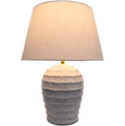 Blue-grey ribbed ceramic table lamp with tapered linen shade for relaxed coastal interiors