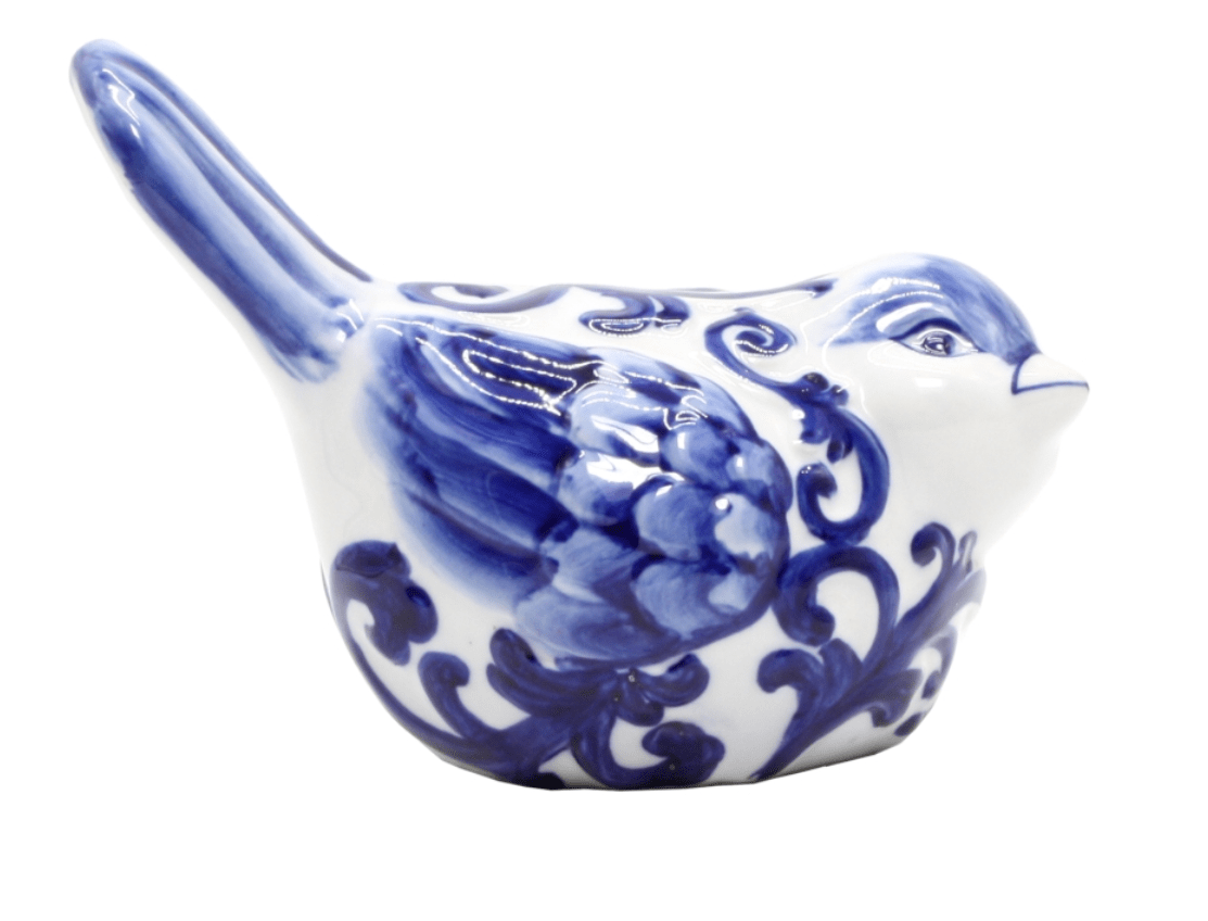 Blue and white porcelain bird sculpture with hand-painted filigree detail