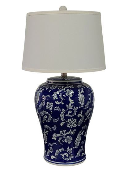 Blue and white ceramic table lamp with intricate patterned base and white tapered shade