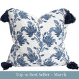 Bluebell Bloom blue and white floral cushion with botanical print and navy tassel trim