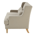 Side view of Bondi Hamptons 2 Seat Sofa showing sloping upholstered arm, high back and tapered timber legs.