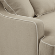 Close-up of Bondi Hamptons Sofa showing natural textured upholstery and contrasting white piping along the arm.