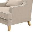 Close-up of Bondi Hamptons Armchair showing tailored arm, white piping and solid timber legs.