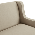Bondi Hamptons Sofa close-up showing the gently curved arm, natural upholstery and tailored white piping.